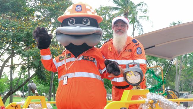 Peter Windle and Paddy the Platypus in the annual Christmas Pageant and Parade down the Esplanade and Knuckey Streets. Picture: Glenn Campbell