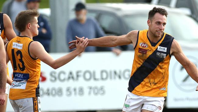 Adam Iacobucci celebrates a goal with a teammate. Picture: Hamish Blair