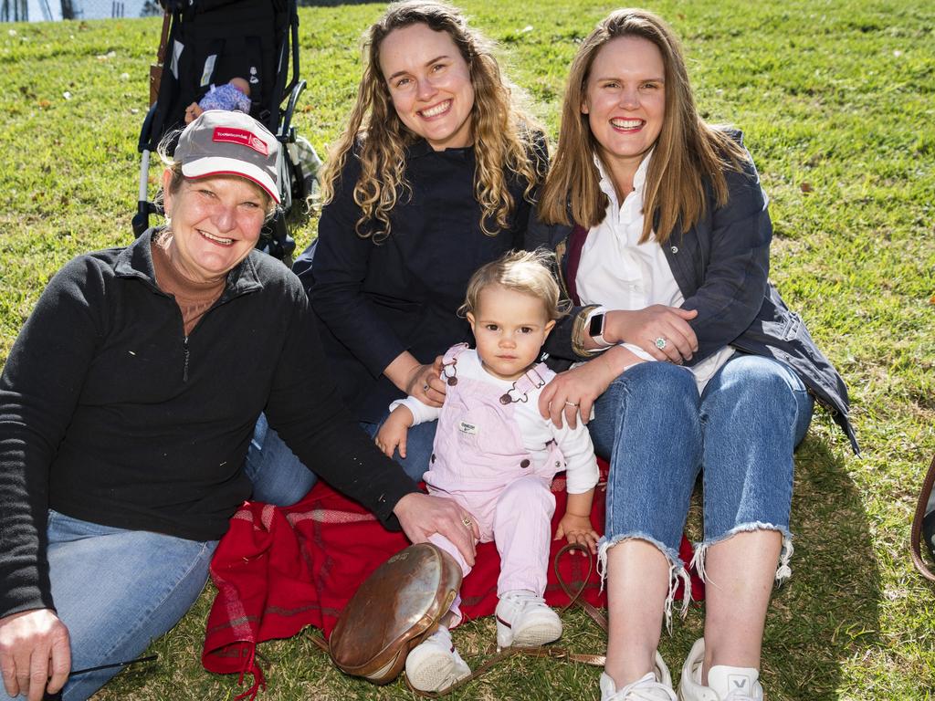 Getting behind Downlands are (from left) De Cameron, Cecilia Cobb, Sumer Norris and Amy Cobb on Grammar Downlands Day at Toowoomba Grammar School, Saturday, August 19, 2023. Picture: Kevin Farmer