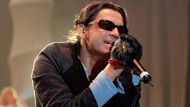 Hutchence performs at a concert in London just months before his death.