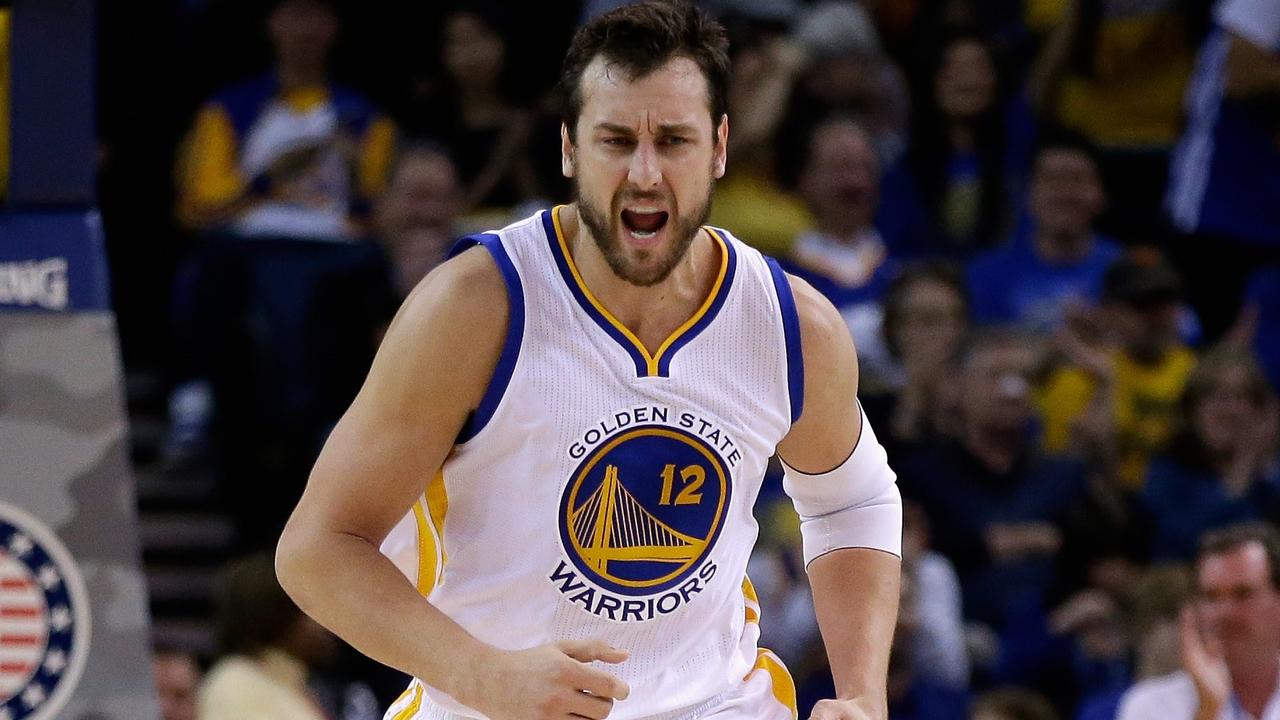 OAKLAND, CA - NOVEMBER 05: Andrew Bogut #12 of the Golden State Warriors reacts after making a basker against the Los Angeles Clippers at ORACLE Arena on November 5, 2014 in Oakland, California. NOTE TO USER: User expressly acknowledges and agrees that, by downloading and or using this photograph, User is consenting to the terms and conditions of the Getty Images License Agreement. Ezra Shaw/Getty Images/AFP == FOR NEWSPAPERS, INTERNET, TELCOS & TELEVISION USE ONLY ==