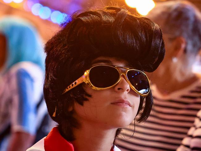 A young Elvis impersonator awaits the Elvis Express at Sydney’s Central Station, heading to the Parkes Elvis Festival to celebrate this year’s theme, “Jailhouse Rock.” Picture: Jenny Evans/Getty Images