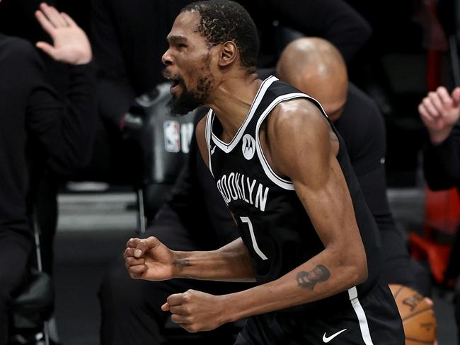 NEW YORK, NEW YORK - JUNE 19: Kevin Durant #7 of the Brooklyn Nets reacts in the second quarter against the Milwaukee Bucks during game seven of the Eastern Conference second round at Barclays Center on June 19, 2021 in the Brooklyn borough of New York City. NOTE TO USER: User expressly acknowledges and agrees that, by downloading and or using this photograph, User is consenting to the terms and conditions of the Getty Images License Agreement.   Elsa/Getty Images/AFP == FOR NEWSPAPERS, INTERNET, TELCOS & TELEVISION USE ONLY ==