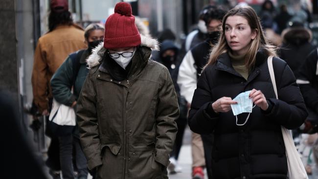 Workers and shoppers in New York. Picture: AFP