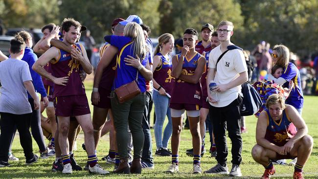 O'Sullivan's Beach/Lonsdale players and officials after the club’s division seven grand final loss to Marion last year. Both teams are now battling for survival in the sixth tier. Picture: AAP/Bianca De Marchi