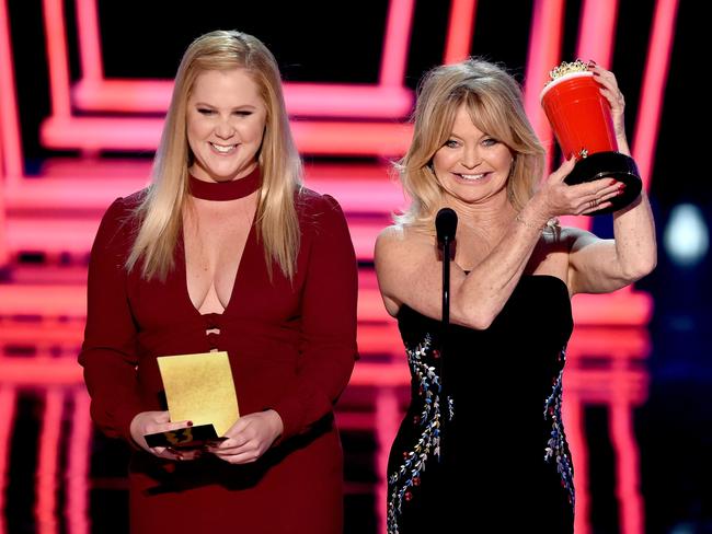 Amy Schumer and Goldie Hawn speak onstage during the 2017 MTV Movie And TV Awards at The Shrine Auditorium on May 7, 2017 in Los Angeles, California. Picture: Getty