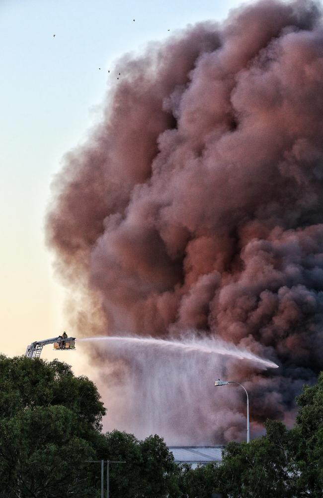 Firefighters tackling the blaze. Picture: Hamish Blair