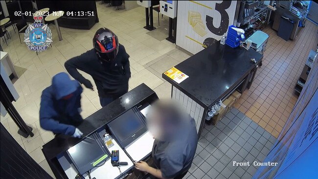 Police have released terrifying vision of the moment two men pull knives on a worker at Canning Vale McDonald's. Picture: WA Police