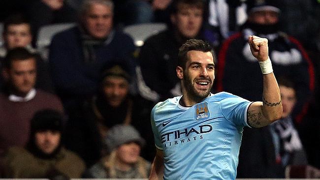 Topping the table ... Manchester City's Alvaro Negredo celebrates his goal during the match against Newcastle United at St Ja...