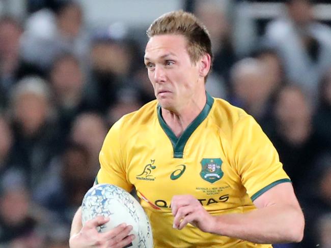 Dane Haylett-Petty of Australia gets through the tackle of Jack Goodhue of New Zealand during the second Bledisloe Cup match between New Zealand and Australia at Eden Park in Auckland, New Zealand, Saturday, August 25, 2018. (AAP Image/Peter Meecham) NO ARCHIVING, EDITORIAL USE ONLY