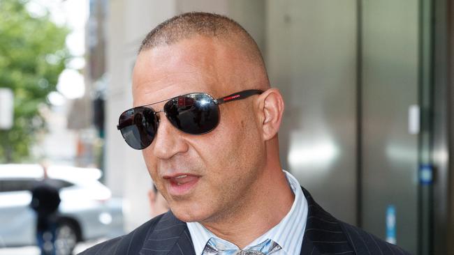 DAILY TELEGRAPH. Lawyer Adam Houda leaves the John Maddison Tower law courts in Sydney where he was facing sexual harassment charges from fellow lawyer Hana Seraphim. Monday 21/10/2024. Picture by Max Mason-Hubers