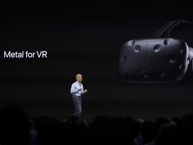 Craig Federighi, Apple's senior vice president of software engineering, speaks on stage. Picture: Marcio Jose Sanchez/AP