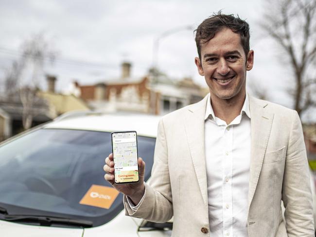 DiDi Australia's Dan Jordan with the company's rideshare app that will launch in Toowoomba on August 10.