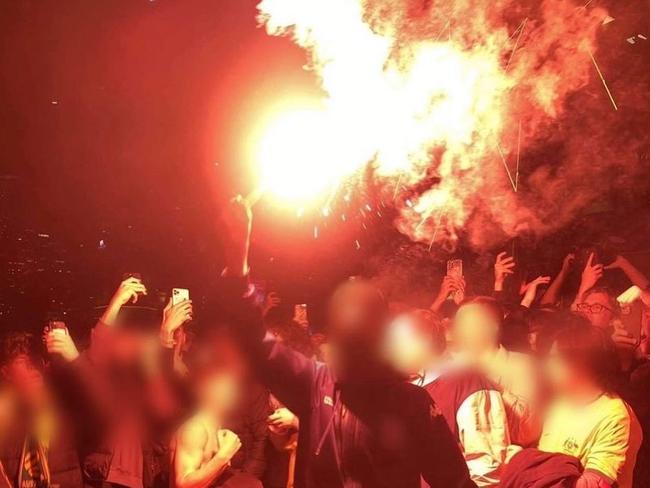 A picture shared on the Instagram page @ultrasmentality_australia of flares being set off at Federation Square.