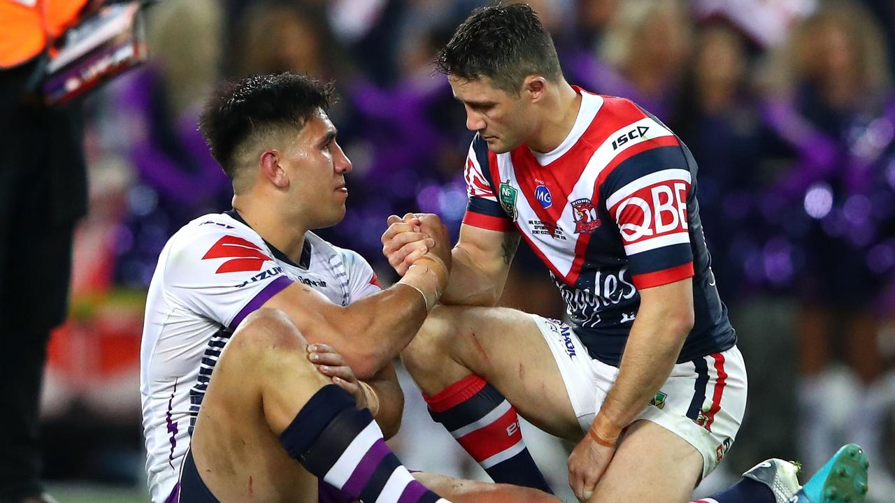 Cooper Cronk consoles Nelson Asofa-Solomona. Picture: Getty Images