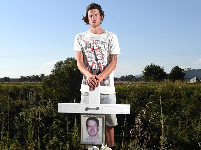 Dale Lewis at the roadside memorial for his twin brother Mark. Picture: Jason Sammon