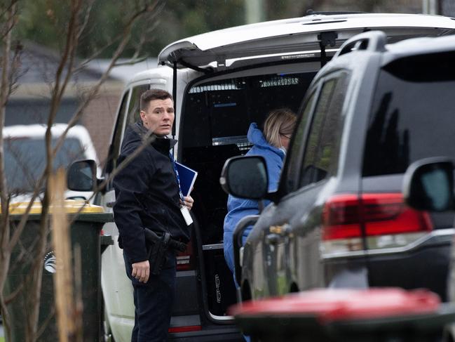 Homicide Squad detectives at the scene where the man was found badly injured. Picture: Nicki Connolly