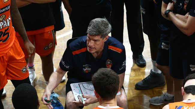 Taipans head coach Mike Kelly inspires his players during a time out in the National Basketball League (NBL) pre season match between the Cairns Taipans and the Brisbane Bullets, held at Early Settler Stadium, Manunda. PICTURE: BRENDAN RADKE.