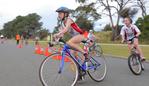 SCHOOLS TRIATHLON CHALLENGE, Bellerive Beach: Mikayla Cooper, of Collegiate competes in the bike leg of the grade 7 individual girls section