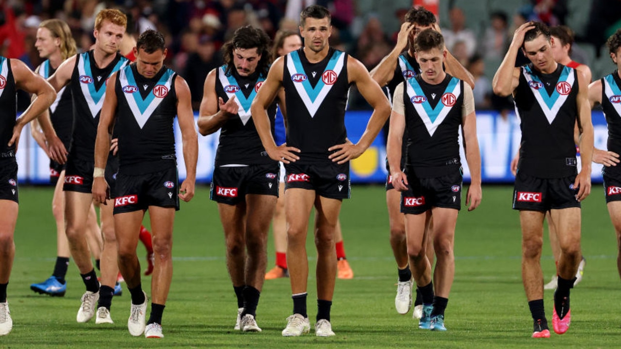 ADELAIDE, AUSTRALIA - APRIL 07: The Power react after their loss during the 2022 AFL Round 04 match between the Port Adelaide Power and the Melbourne Demons at Adelaide Oval on April 07, 2022 In Adelaide, Australia. (Photo by James Elsby/AFL Photos via Getty Images)