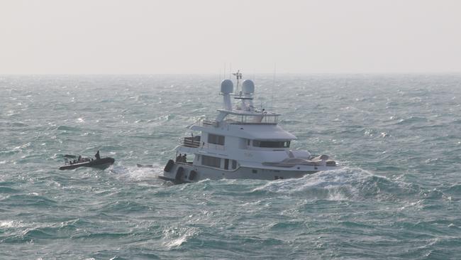 A Rigid Hull Inflatable Boat team rescue mariners from MY Vivierae II off the coast of Northern Australia.