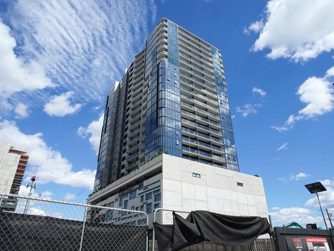 MELBOURNE AUSTRALIA - NewsWire Photos DECEMBER 28, 2024: Photo of Liberty 1 building in Footscray with diggers in the front where Liberty 2 was to be built. Homes under construction hang in balance as Bensons Property Group enters administration, Picture: NewsWire / Luis Enrique Ascui