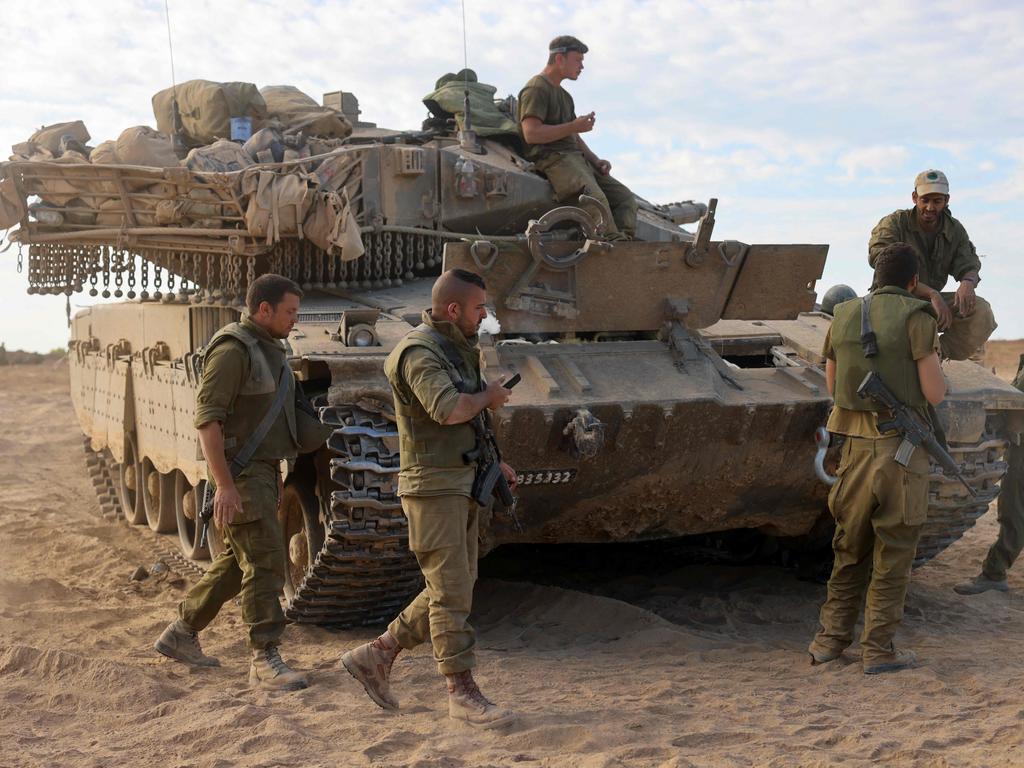 Israeli soldiers deploy near the border with Gaza as President Joe Biden travels to Israel. Picture: AFP