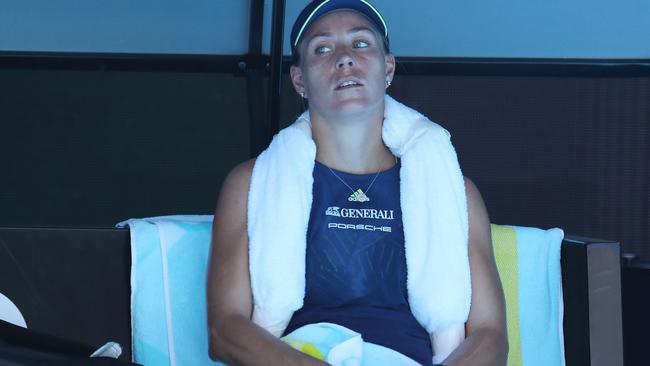 Angelique Kerber takes a break and makes use of the ice towels. Picture: Getty