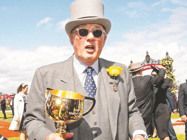 MELBOURNE, AUSTRALIA - NOVEMBER 07: Owner Lloyd Williams celebrates with the cup after winning race 7, the Emirates Melbourne Cup with his horse Rekindling on Melbourne Cup Day at Flemington Racecourse on November 7, 2017 in Melbourne, Australia. (Photo by Paul Rovere/Getty Images)