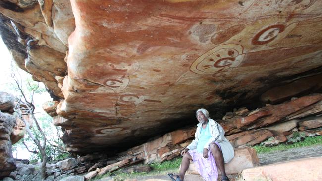 Janet Oobagooma at a Wandjina rock art site in the northwest Kimberley. Picture: Dambimangari and Wunambal Gaambera Aboriginal Corporations