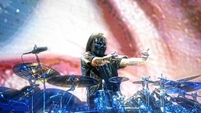 Jay Weinberg stands up from behind the drumkit during Slipknot's performance at the Brisbane Entertainment Centre. Picture: Asagai Images