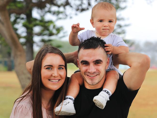 Moloney with wife Chelsea and son Lee. Picture: Scott Powick