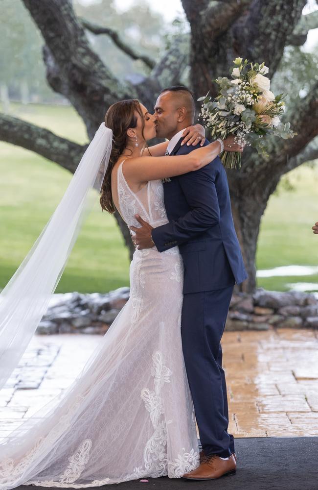 Katelyn Alexander and Avilash Singh let the rainfall down on their wedding day. Pictures: Salt Studios