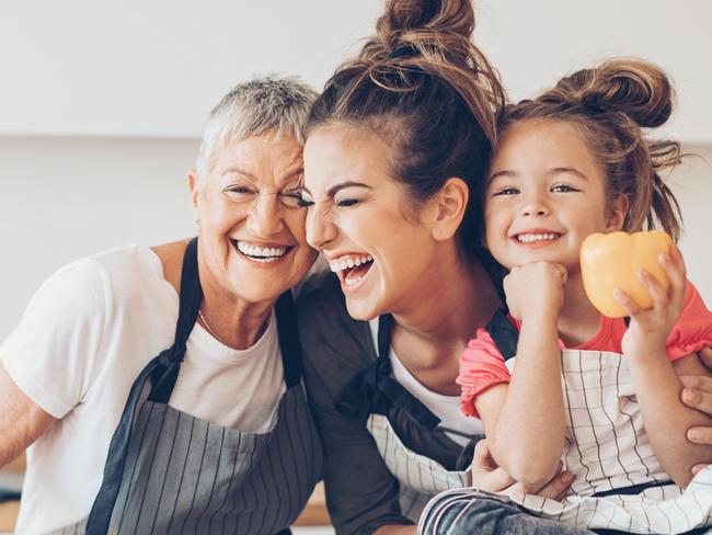 News Corp Australia's 2017 Win Groceries for a Year worth $25,000 Competition - stock image. Grandmother, mother and child with groceries.