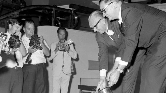 The time capsule being placed into the ground. Picture: Gold Coast Libraries Local Studies Collection