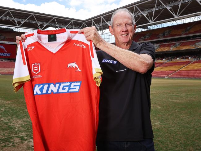 Coach Wayne Bennett  holding the first Dolphins jersey, The Dolphins announce a sponsor and their first jersey, Suncorp Stadium, Milton. Picture: Liam Kidston.