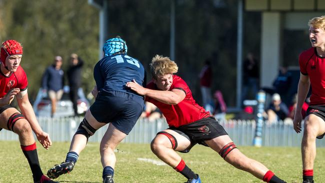 Tom Robinson tackles Will Sheedy last weekend.- Picture: Richard Walker