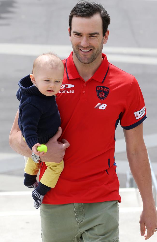 Lewis with Freddie after signing a deal with Melbourne. Picture: Michael Klein