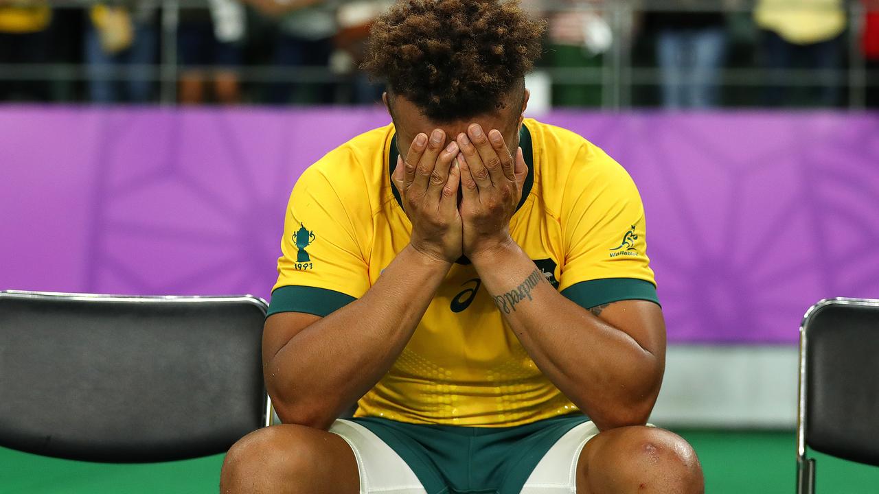Will Genia of Australia looks dejected following defeat in the Rugby World Cup.