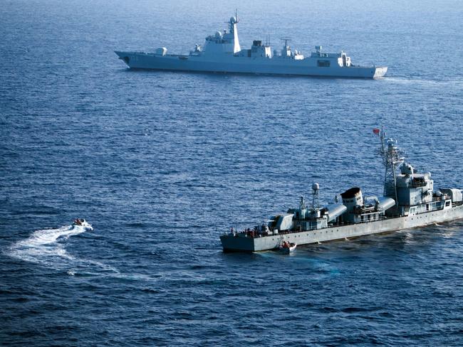 (FILES) This file photo taken on May 5, 2016 shows crew members of China's South Sea Fleet taking part in a drill in the Xisha Islands, or the Paracel Islands in the South China Sea. Beijing braced on July 12, 2016 for an international tribunal's ruling on the South China Sea, where it has expansive territorial claims, with all eyes watching for the Asian giant's reaction on the ground or in the water. Beijing claims sovereignty over almost the whole of the South China Sea, on the basis of a segmented line that first appeared on Chinese maps in the 1940s, pitting it against several neighbours. / AFP PHOTO / STR / China OUT