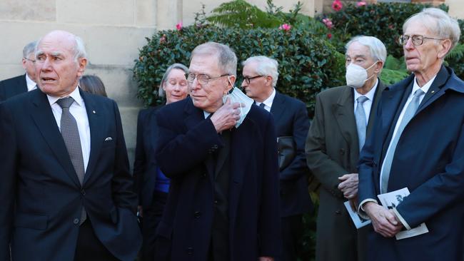 Former prime minister John Howard with former High Court judges Michael Kirby and Kenneth Hayne following the service for former High Court judge Gerard Brennan. He was instrumental in the Mabo decision being handed down. Picture: John Feder/The Australian