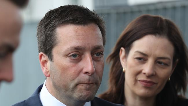 Victorian opposition Leader Matthew Guy with his wife Renae Guy at Cranbourne railway station in Melbourne today. Picture: AAP