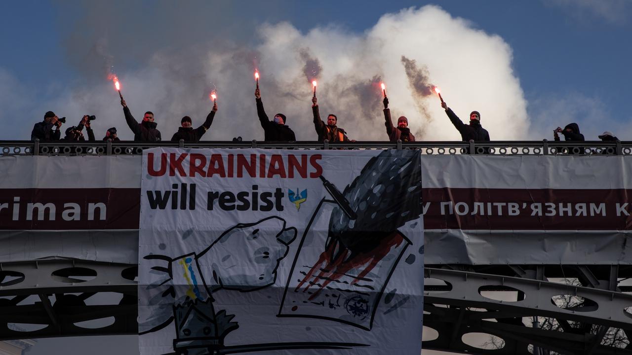 People participate in a Unity March to show solidarity and patriotic spirit over the escalating tensions with Russia on February 12, 2022 in Kiev, Ukraine. Picture: Chris McGrath/Getty Images