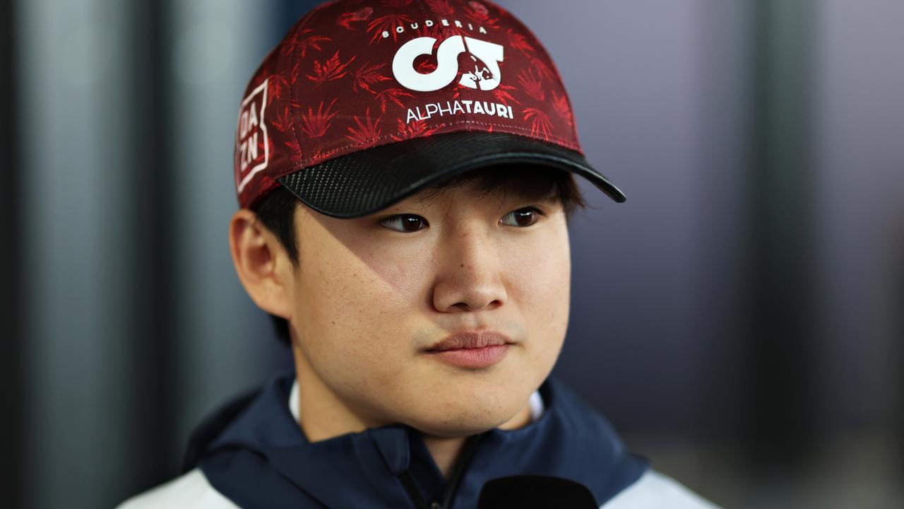 NORTHAMPTON, ENGLAND - JUNE 30: Yuki Tsunoda of Japan and Scuderia AlphaTauri talks to the media in the Paddock during previews ahead of the F1 Grand Prix of Great Britain at Silverstone on June 30, 2022 in Northampton, England. (Photo by Peter Fox/Getty Images)