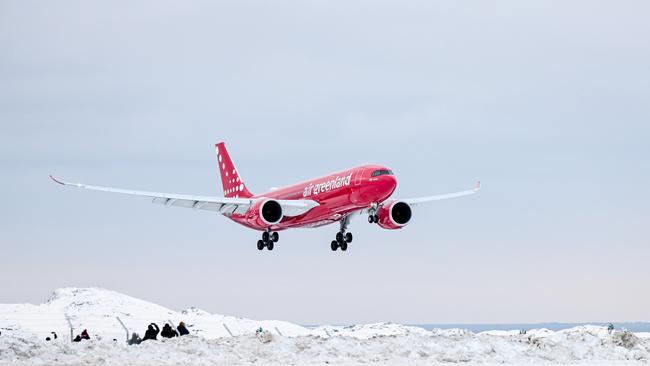 An Air Greenland aircraft landing at the new airport in Greenland.