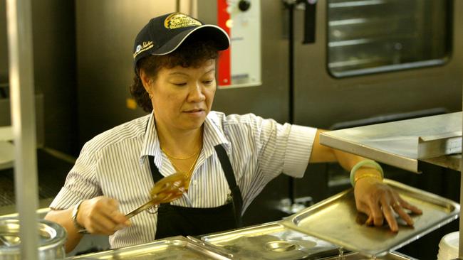 Jenny Wood “at work” cooking up her sauces at the Breakfast Creek Hotel in 2004.