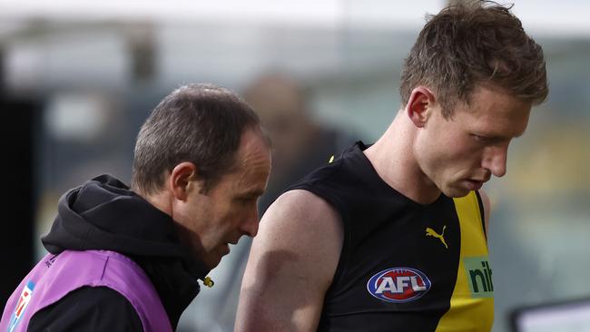 Dylan Grimes after suffering a hamstring injury against the Brisbane Lions.