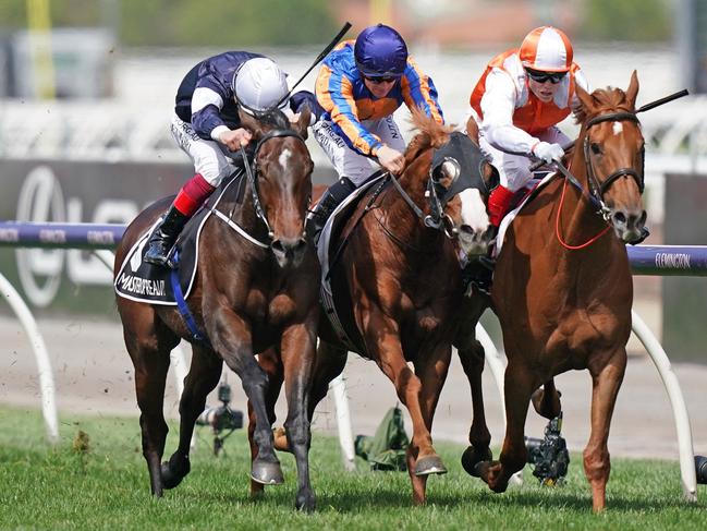 Jockey Craig Williams (right) rides Vow And Declare to victory in race 7, the Lexus Melbourne Cup, during Melbourne Cup Day, at Flemington Racecourse in Melbourne, Tuesday, November 5, 2019. (AAP Image/Scott Barbour)