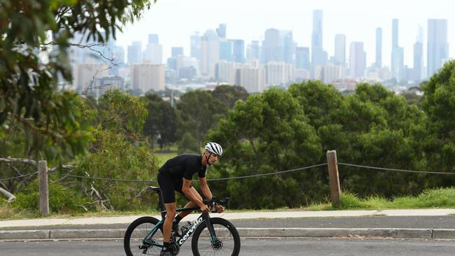 Nick Percat, Supercar driver for Brad Jones Racing, rides his bicycle in Melbourne. Picture: Robert Cianflone/Getty Images