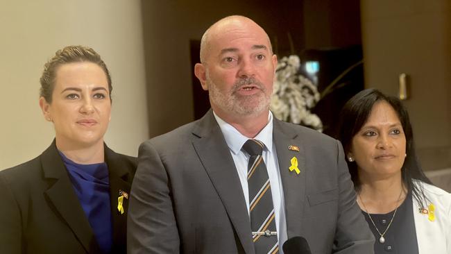 Logistics and Infrastructure Minister Bill Yan (centre) has asked the Department to look at “interim safety measures” to protect users of Kirkland Rd. Picture: Fia Walsh.